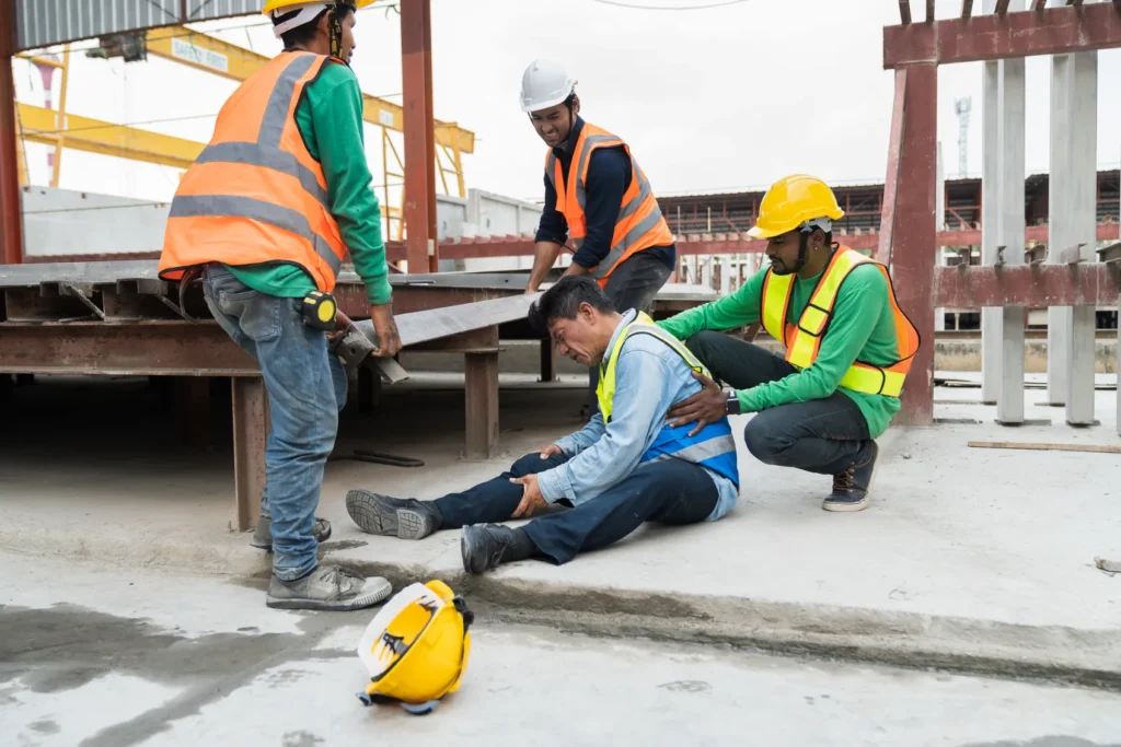 An injured man on a construction site.