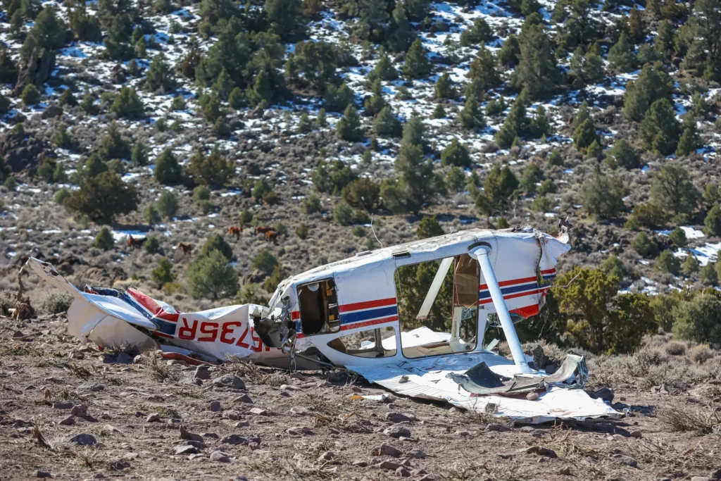 Small aircraft crashed in mountain range.
